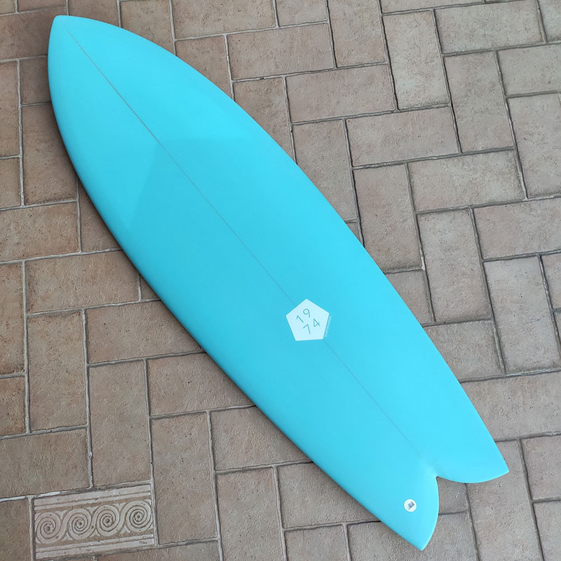 Twin fin fish surfboard in california