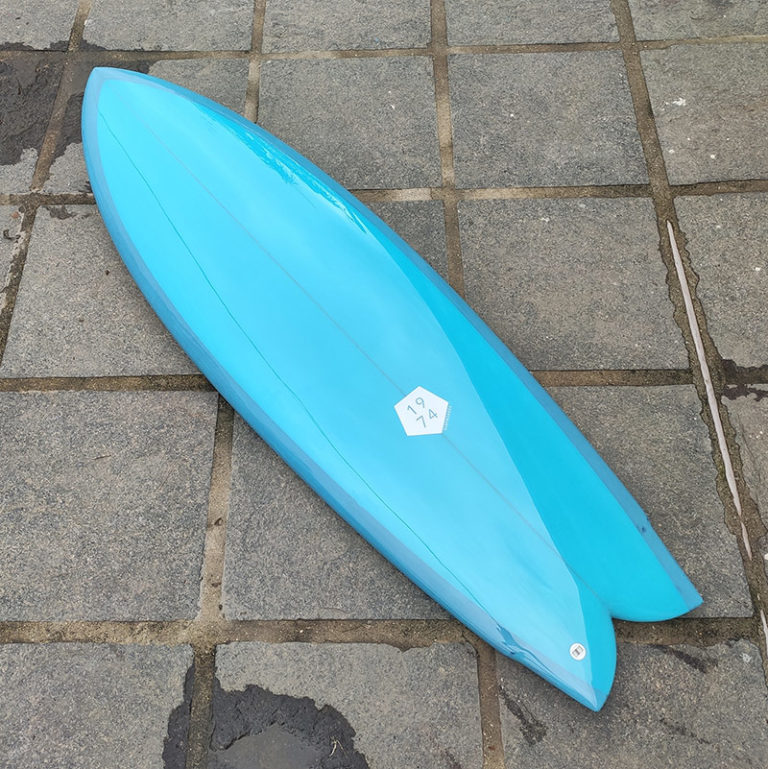 Quad fin fish surfboard
