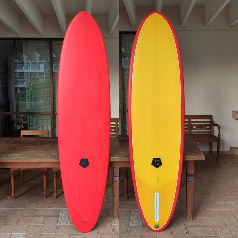 Single fin mid length surfboard